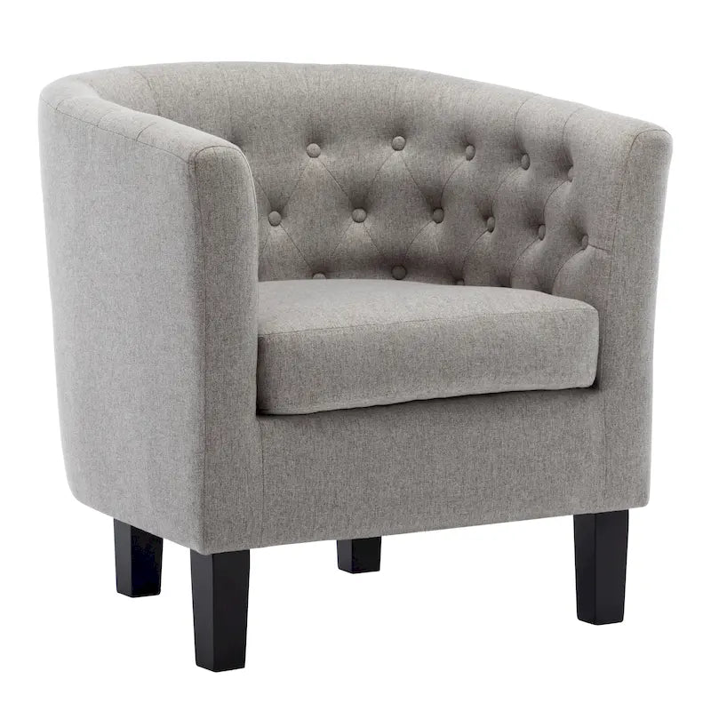 Fauteuil club capitonné en tissu