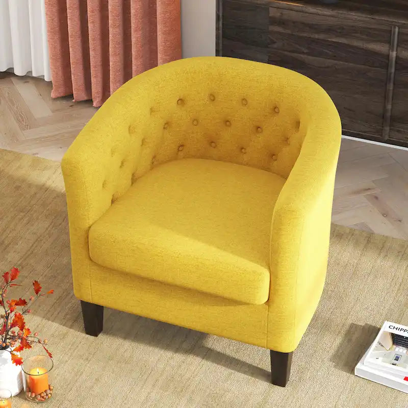 Fauteuil club capitonné en tissu