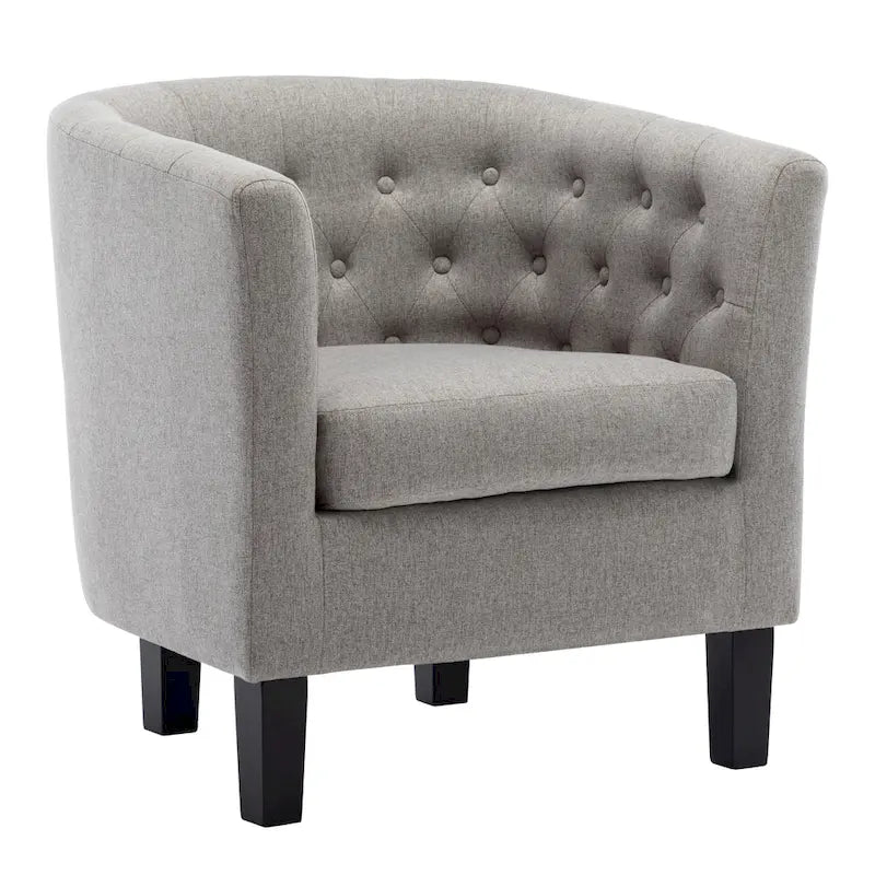 Fauteuil club capitonné en tissu