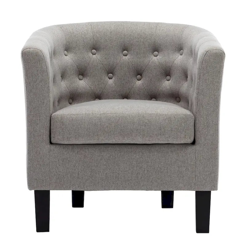 Fauteuil club capitonné en tissu