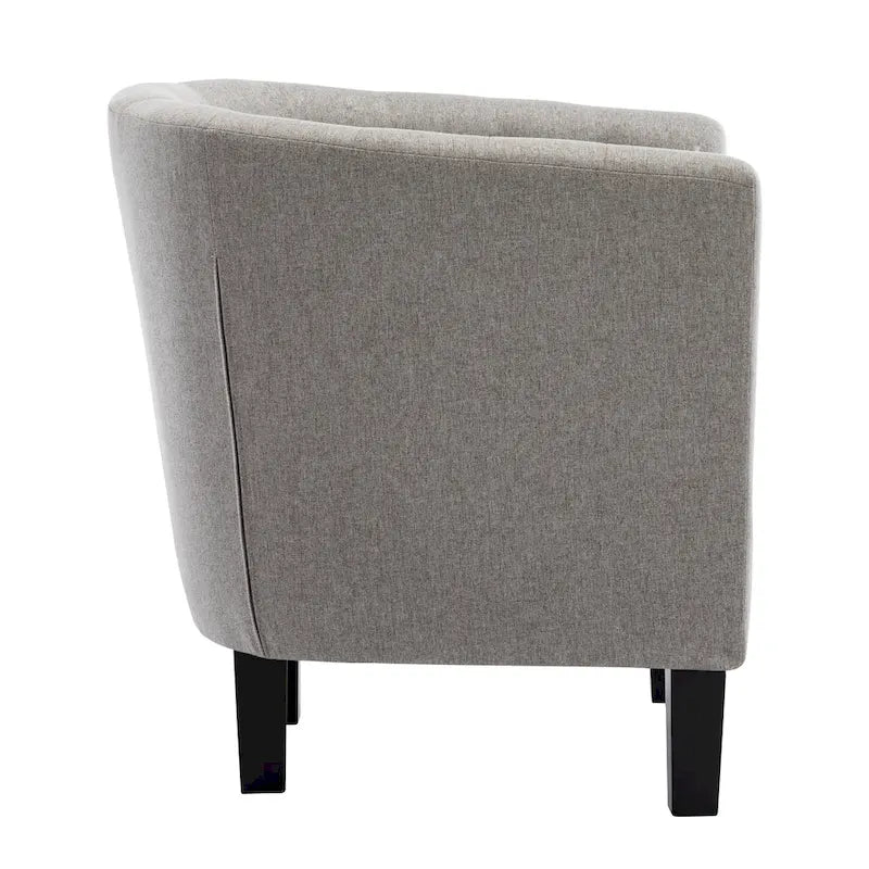 Fauteuil club capitonné en tissu